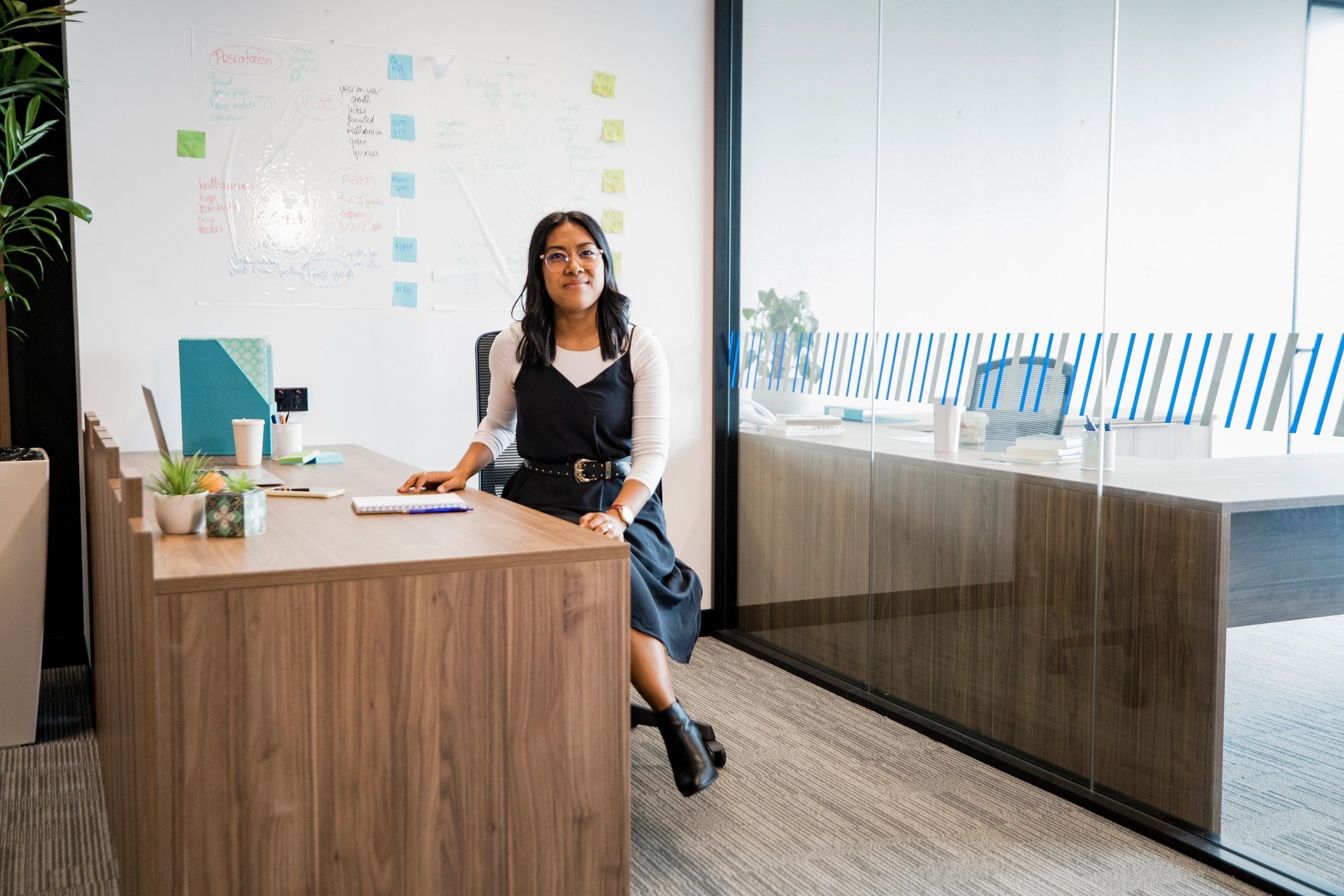 Professional consultant seated at a desk in an office